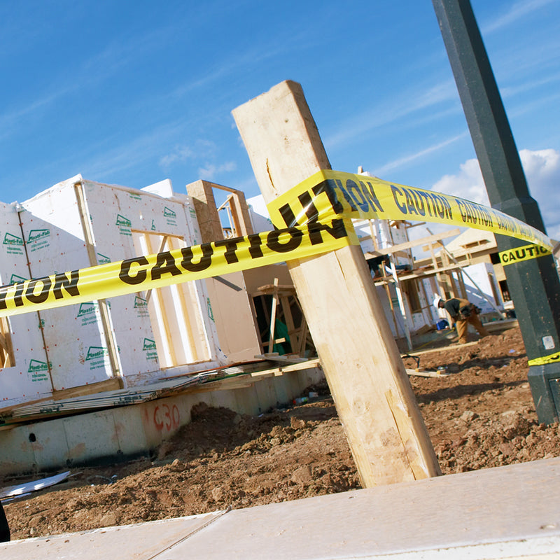 BT-series Barricade Message Safety Tape (3 in x 1,000 ft) 12 /case in use on a jobsite