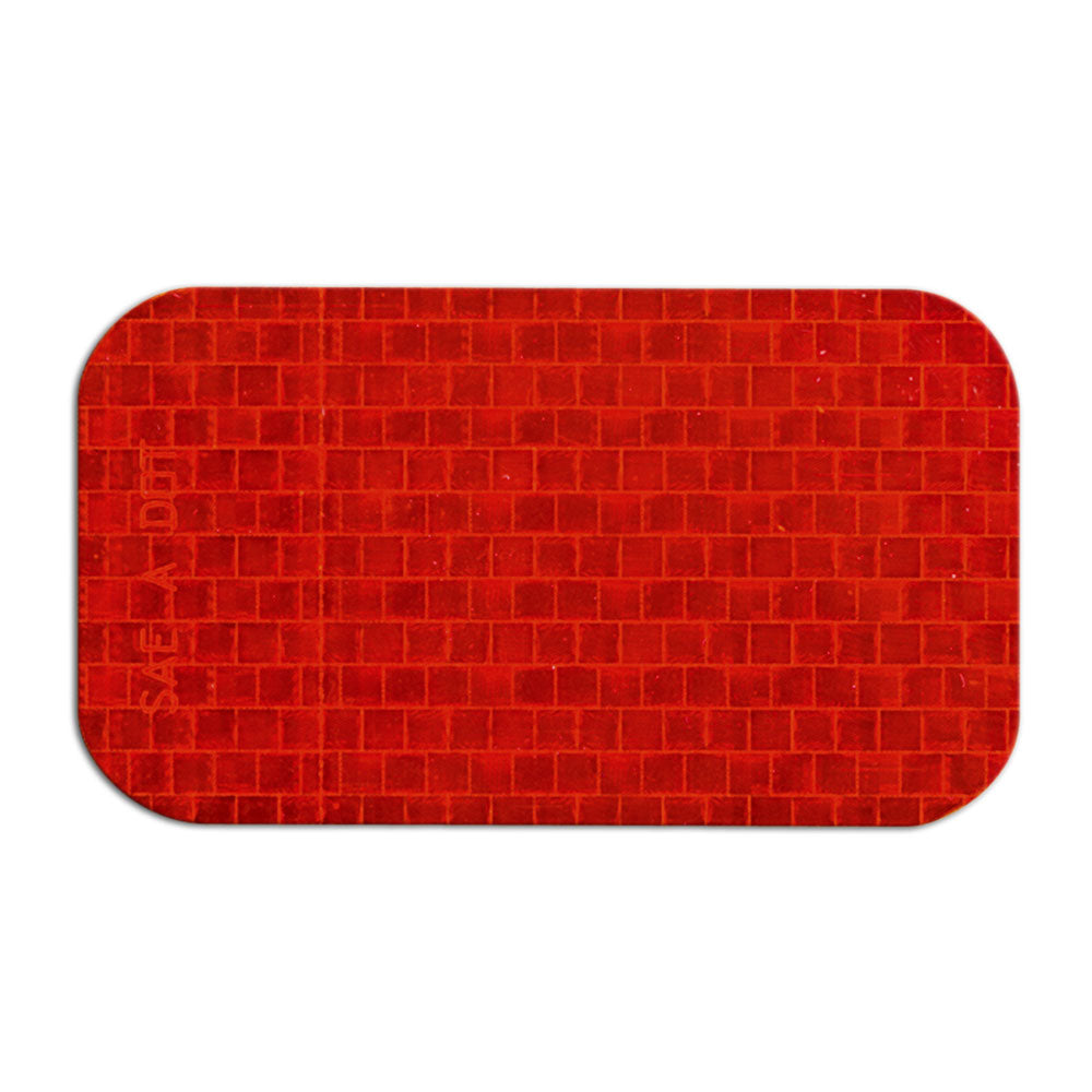 RR2510RD 510 per roll Red SAE A DOT Die Cut Adhesive Reflex Reflectors (2 in x 3.5 in) close up single reflector image