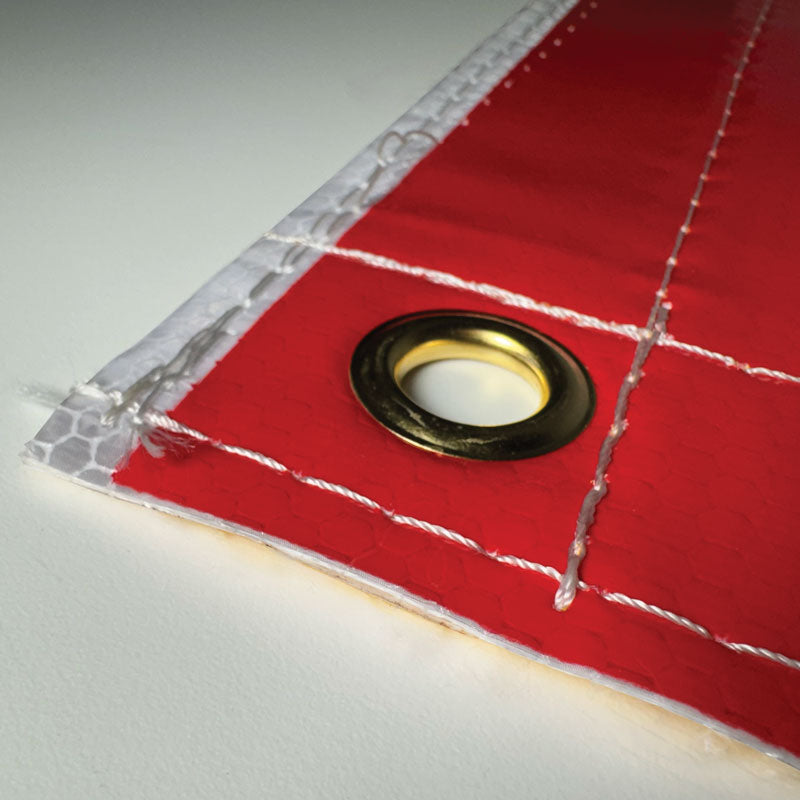 TS8015DSBR Ultra Durable OVERSIZE LOAD / "D" Double Sided Over-Dimensional Load Sign Refelctive Banner (12 in x 96 in) Close up of grommet on "D" side