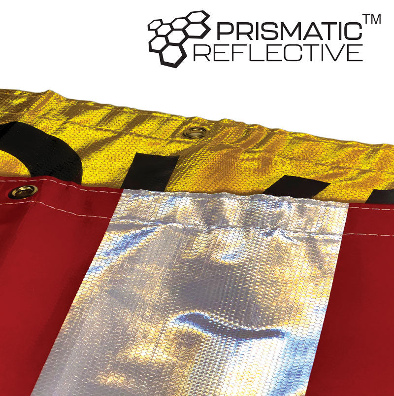 TS8015DSBR Ultra Durable OVERSIZE LOAD / "D" Double Sided Over-Dimensional Load Sign Refelctive Banner (12 in x 96 in)  Close up of reflective properties