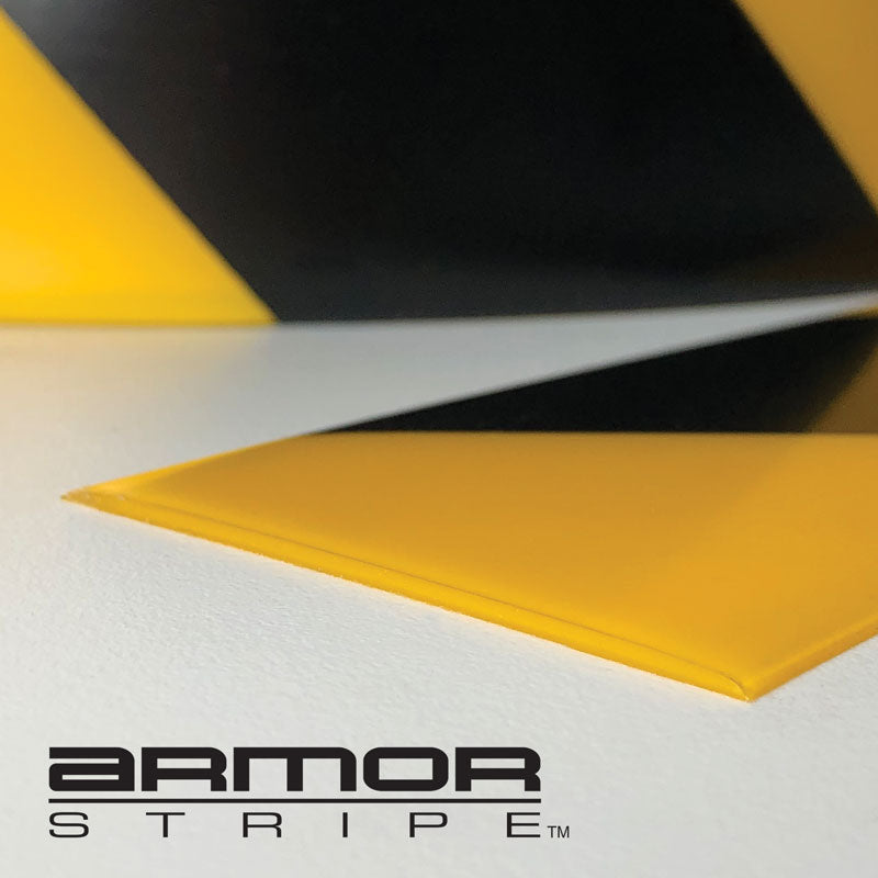 AS350 Yellow/Black ArmorStripe™ Hazard Stripe High Traffic Ultra-Durable Heavy Duty Warehouse Adhesive Floor Marking Tape (100 ft) Close up of bevelled edge