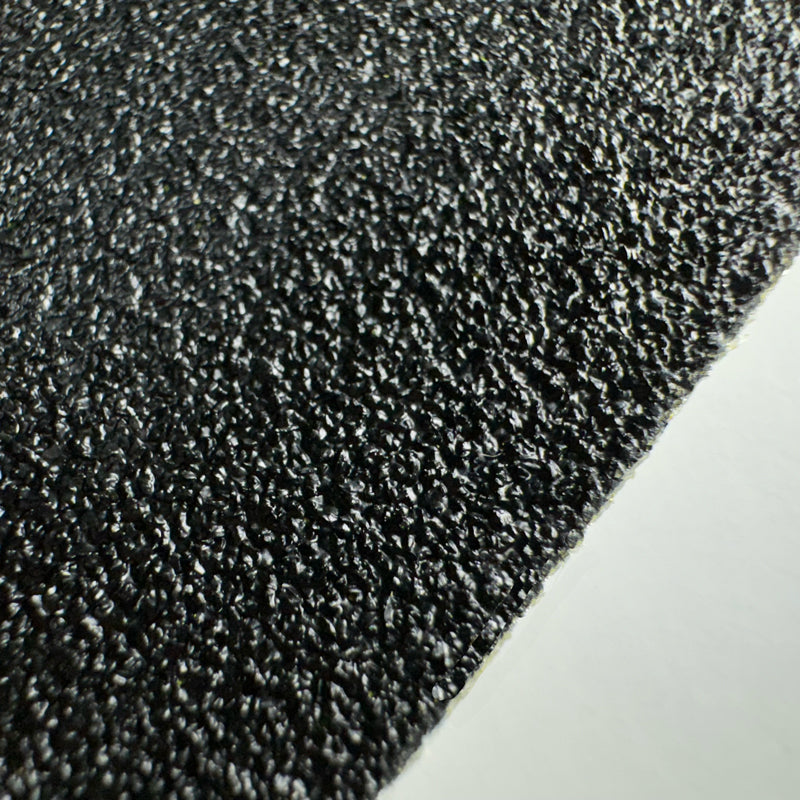 Gator Grip® Conformable Foil Backed Black Anti-Slip Grip Roll 46-grit Traction Tape close up of grit surface