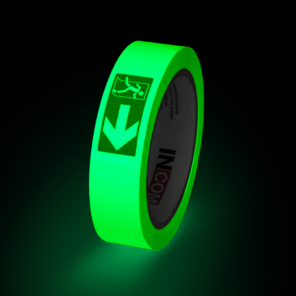 GT130EXR Fire Exit Right Directional Glow-in-the-Dark Phololuminescent Adhesive Safety Tape (1 in x 30 ft)  glowing under low light conditions