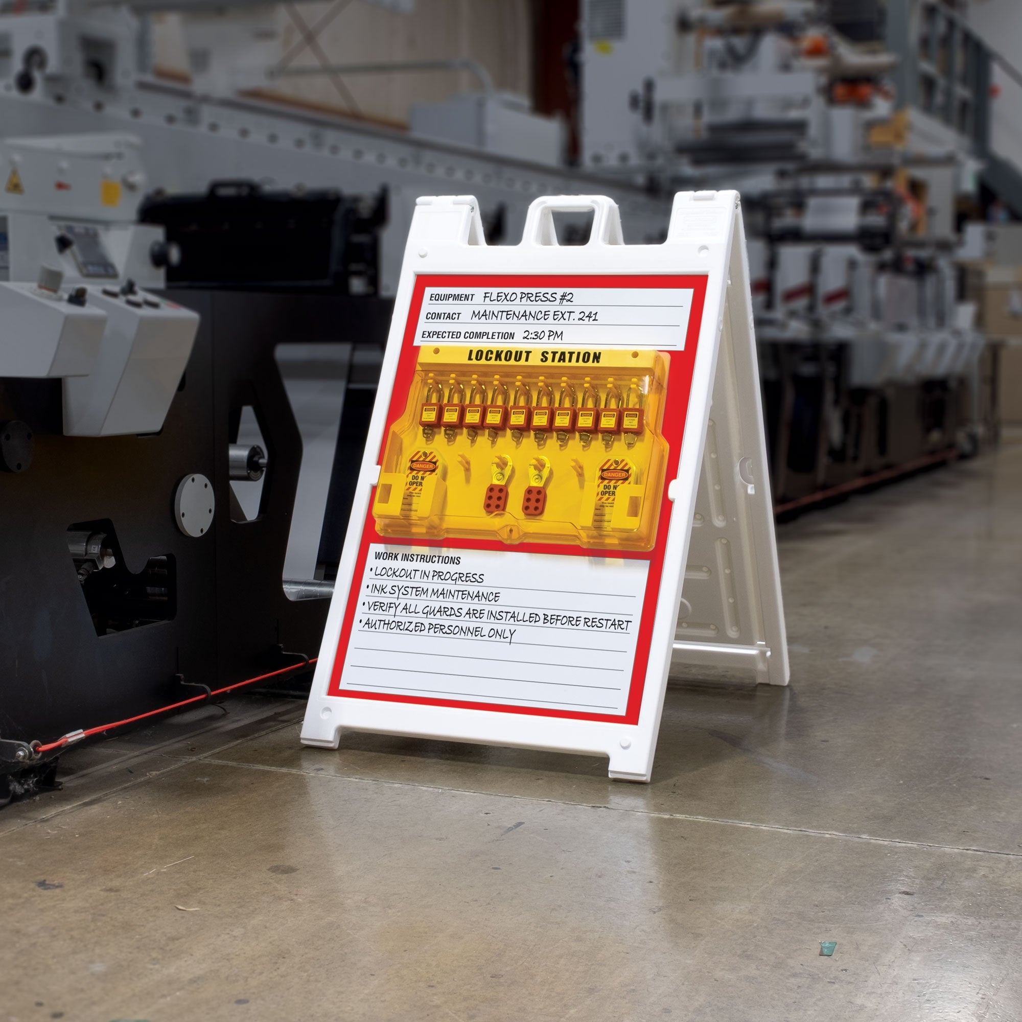 HV2000 DANGER LOCKOUT PROCEDURES IN PROGRESS LARGE FORMAT A-FRAME SIGN WITH MOUNTED LOCKOUT/TAGOUT STATION ATTACHED in Use