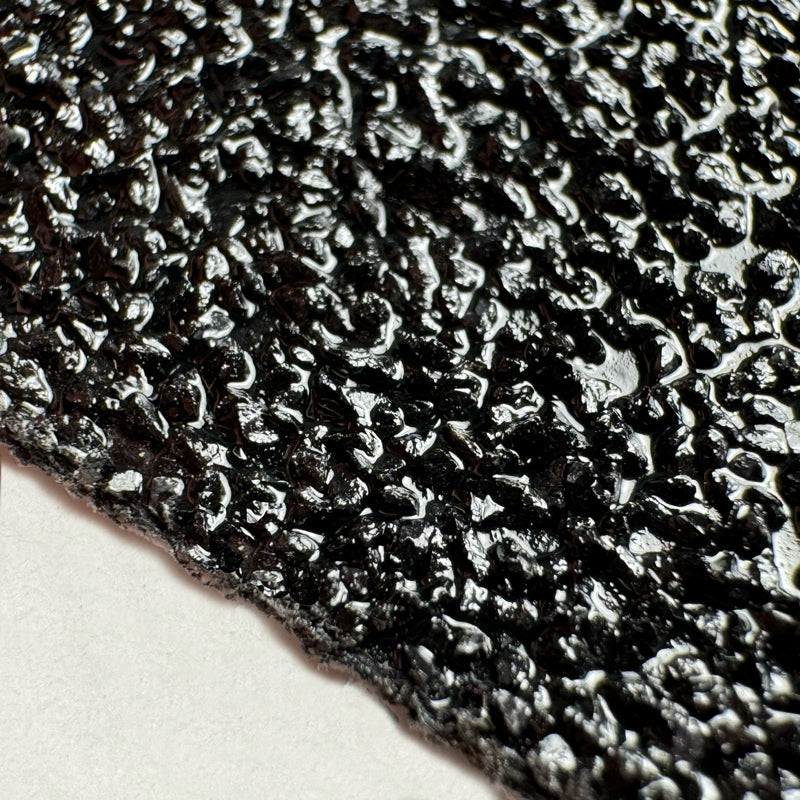 Gator Grip® Black Heavy Duty Coarse HD Roll 36-grit Anti-Slip Grip Traction Tape close up of grit surface