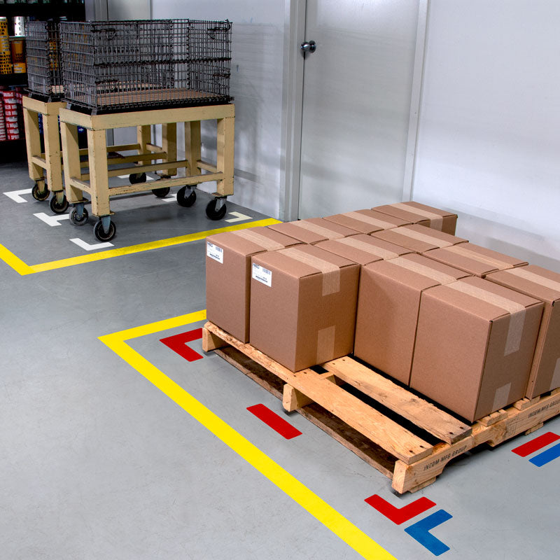  TM-series 5S/Lean Tuff Mark™ High Traffic Durable Warehouse Adhesive Warehouse Floor and Position Markers (20 /pkg) applied to a warehouse floor for organization
