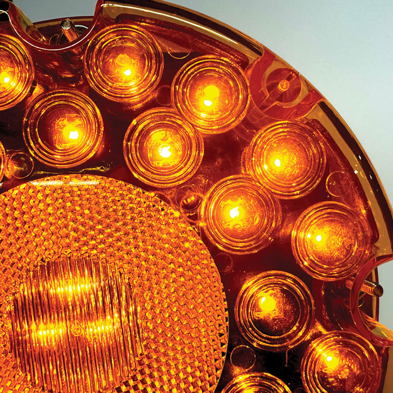 TS8130 Vehicle Mountable Illuminated Light-Up Pilot Car Sign Frame (72 in x 24 in x 5.5 in) close up of orange flashing light