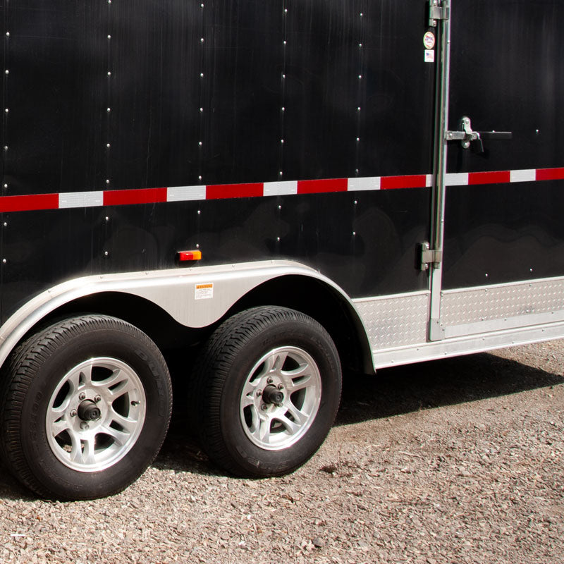 V57203 DOT Conspicuity Adhesive Reflective Trailer Tape (7in /11 in white/red pattern) 2 in x 150 ft applied to the side of a trailer